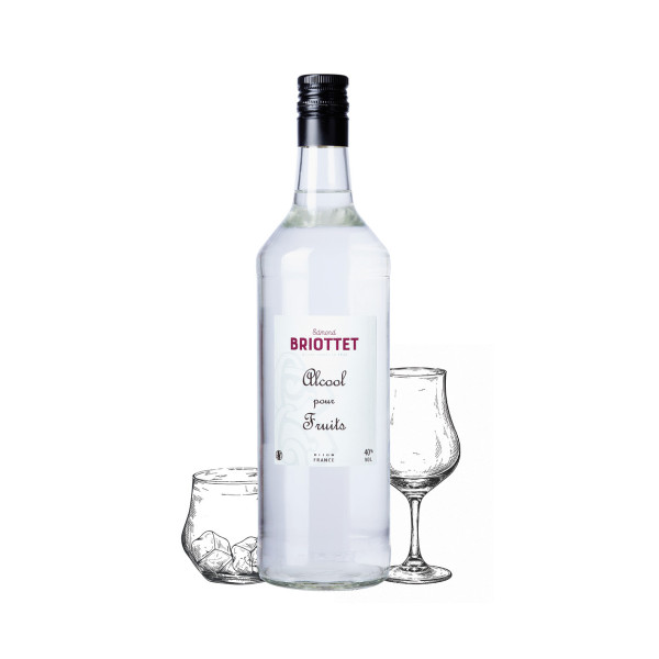 Bottle of fruit liqueur  Maison Briottet, 40% ABV, 70cl, with two cocktail glasses and ice cubes