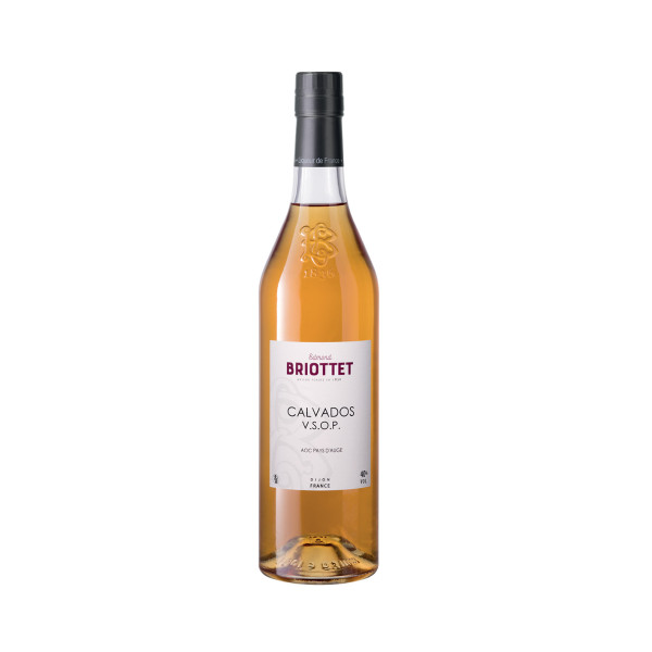 A bottle of Maison Briottet VSOP Calvados, 40% ABV, 70 cl, with a tasting glass and illustrations of apples.