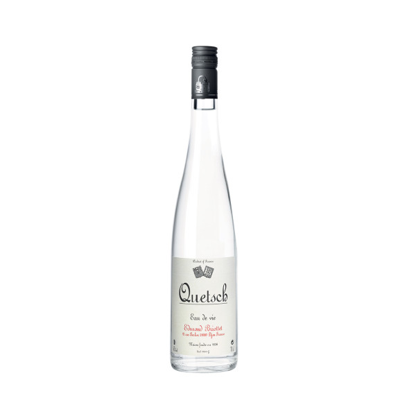 Bottle of Quetsch brandy from Maison Briottet, 45% ABV, 70cl, with two cocktail glasses and ice cubes
