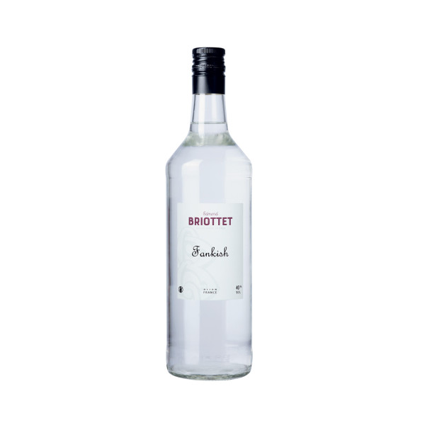 Bouteille de Fankish, Kirsch Fantaisie 40% vol, 1L, avec verre flûte et illustration de cerise.